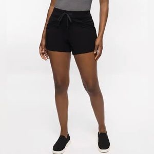 NWT Travis Mathew women “under the sun” black shorts.Size small Relaxed